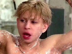 Young guy gets tied up and teased in a gay threeway with big dicks