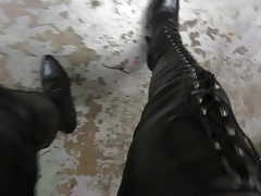 strutting in leather lace up and rear zipper thigh boots