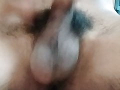 Masturbating