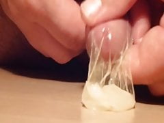 Slow jerking until cum in Condom