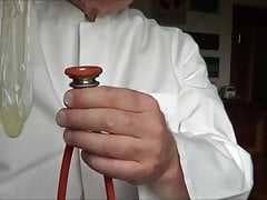 Sperm play with condom and stethoscope