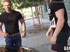 Burly deviant flexing alongside bear before battle