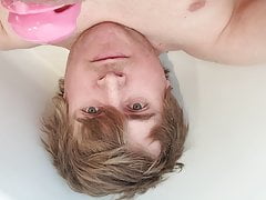 Faggot pissing in his face