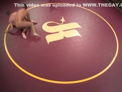 Stripped wrestler overpowers his opponent