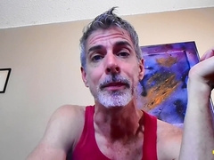 Father Richard Lennox smokes while teasing his son