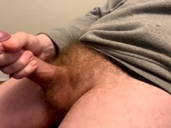 Watch a hairy cock jerk in slow, raw detail
