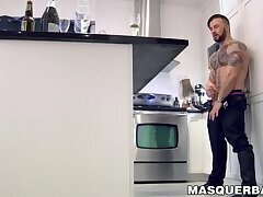 Muscular tattooed gay hunk strokes his huge cock solo