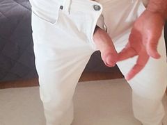 Master Ramon strokes and massages his divine cock in sexy tight white pants