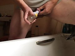 Standing with long floppy foreskin in bathroom - bottle #1