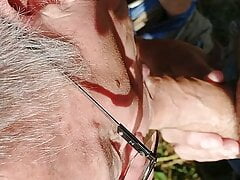 Chrisrug sucks another mate off outdoors
