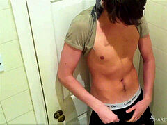 Ollie Lewis wanks Off in restroom