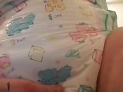 Chubby diaper boy pleases himself