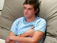 Youngster plays with his huge erect cock