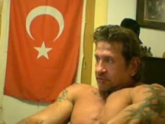 Steamy gay Turkish muscle hunk shows off his muscles
