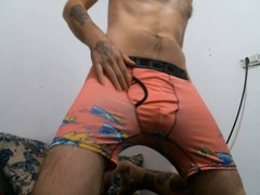 Hot stud shows off his unshaved ass in boxer briefs