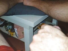 Master Ramon massages, spits and jerks off his divine cock and watches SM video in hot red satin shorts, hot