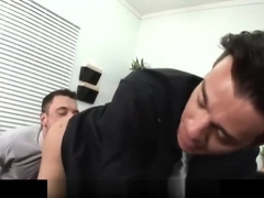 Horny gay business man gives blowjob at the office