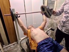 Gay men enjoy candle wax play at the gym and engage in a steamy game