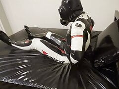 Rubber biker drone masturbation