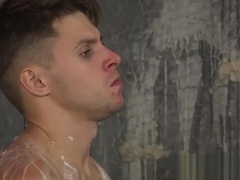 Handsome Dmitry gags on massive dick