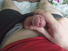 Russian hunk strokes himself through shorts and reveals his cock