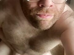 Bear Matt smiles, moans, and groans while stroking a clean juicy load out of his proud little pecker