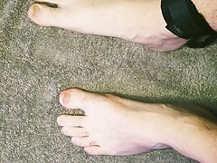 Oiled up foot bondage and whipping