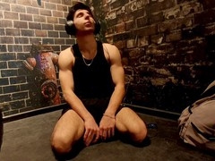 Muscular gamer dude shows off his ripped abs and strokes his big dick