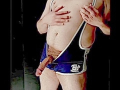 Wrestler in tight singlet indulges in post-match self-pleasure