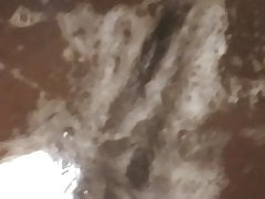 Showing off my soapy ass in the shower