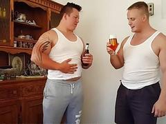 Two chubby guys feed each other and worship their bellies