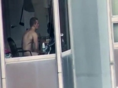 Hot neighbor caught wanking through window