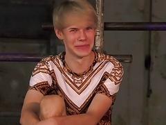 Dominated twink has his body covered in hot wax