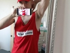Gay hunk with uncut dick, hairy chest, and toned muscles