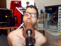 Gay boy locked in cage of Priapus gets toyed with huge dildos and throat training