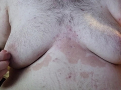 obese plays with his XXL bra-stuffers