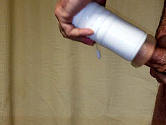 observe throughl Fleshlight type masturbator up close