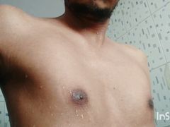 Indian boy taking bath