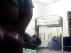 latin chub cums on a glass