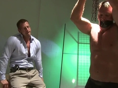 Tied up and left to the mercy of the two dominant men