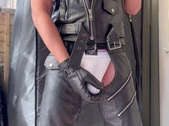 Revealing my leather chaps, jockstrap, and gloves while showing off my ass and bulge from a different angle