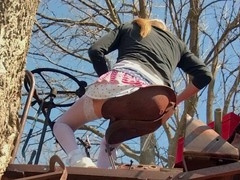 Crossdresser showcases lingerie in a seductive farm setting