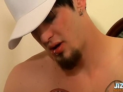 Inked youngster ejaculates on his glass of soda and swallows it