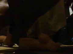 Masturbating