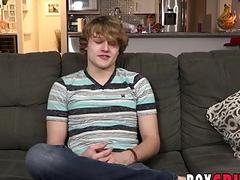 Young gay man strips after an interview and jerks off