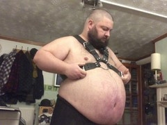 Chubby bear Hoggtubbs in a harness with a big belly and a gay funnel