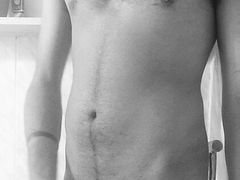 Toned body Teen strokes his dick.