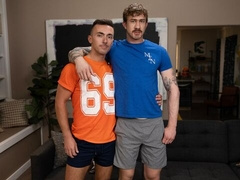 Joey Dane and Evan Jordie go hard in a standing position