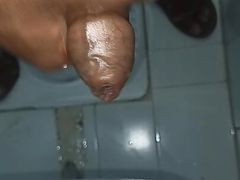 Indian middle age man massage his pennis with oil and gel