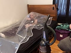 Feb 5 2023 - VacPacked in my long PVC wine dress & my long clear PVC stormjacket with PVC aprons